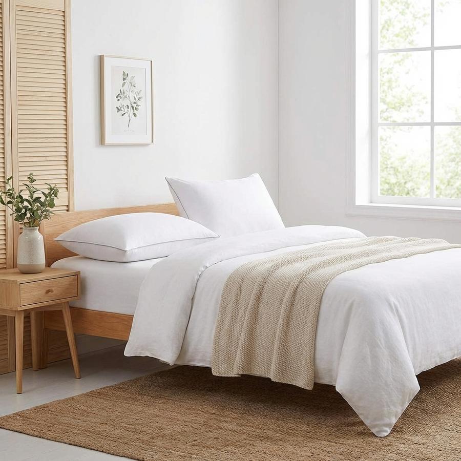 HIMOON pillows in minimalist Scandinavian bedroom